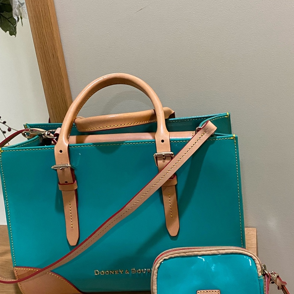 Dooney and Bourke turquoise green patent satchel. Includes two accessories.